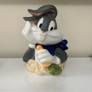 Warner Brothers Bugs Bunny Cookie Jar .Used is around 11 1/2 tall and 7 1/2 wide